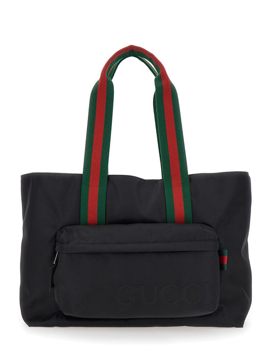 Gucci Men Black Tote Bag With Web Handles And Logo Lettering On The Front In Tech Fabric Man