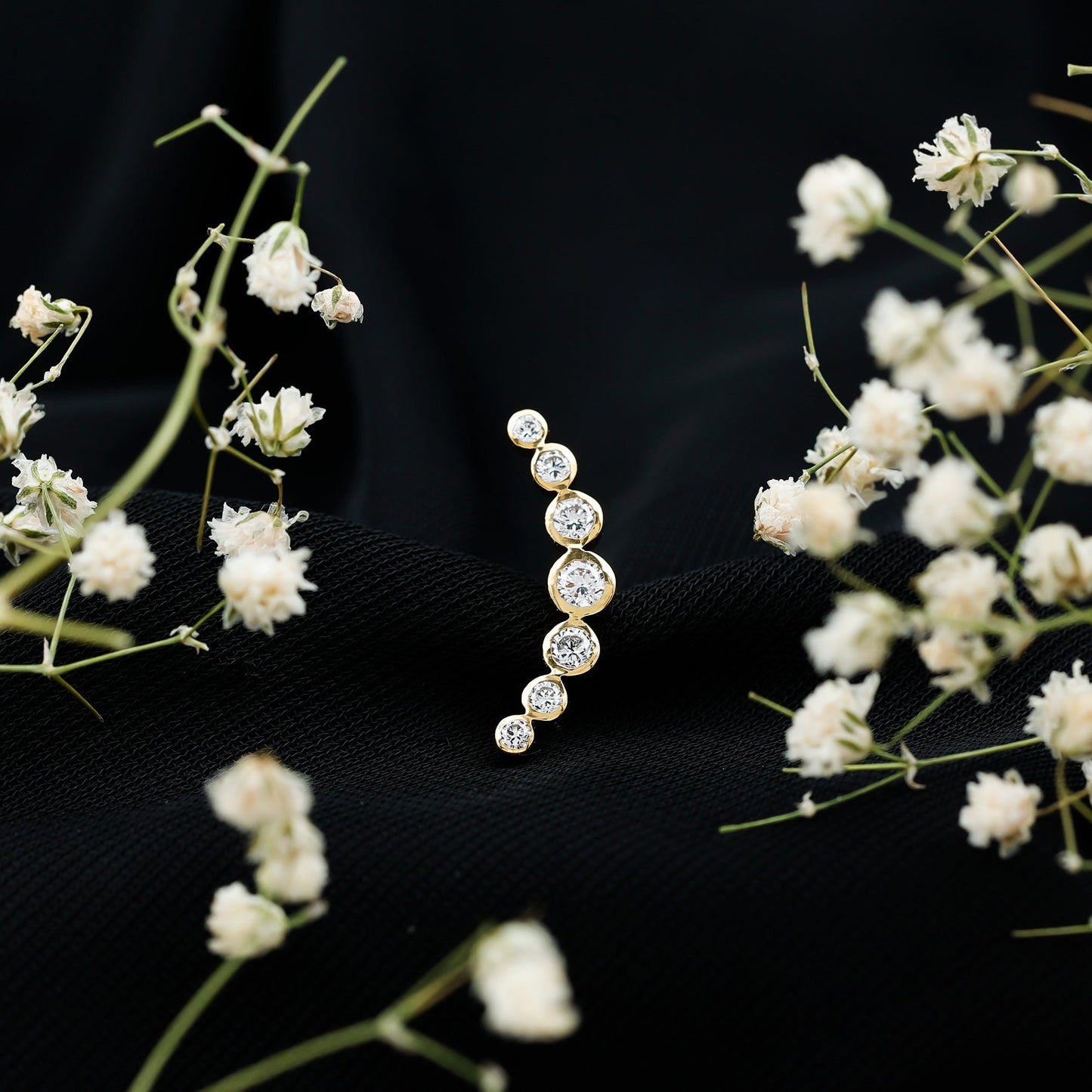 Graduated Bezel Set Moissanite Curved Crawler Earring