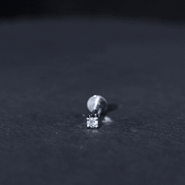 Dainty Round Diamond Conch Earring in Prong Setting