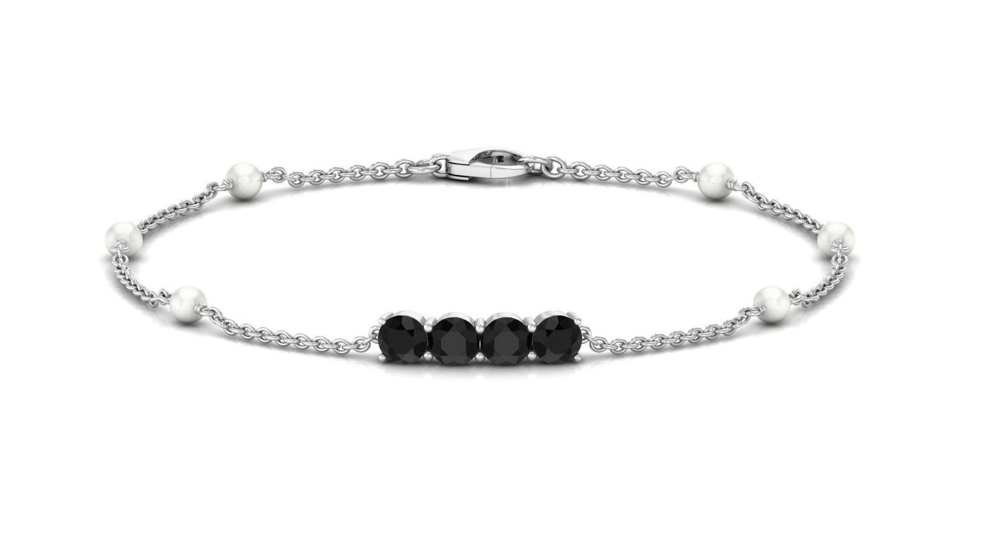 Black Onyx and Freshwater Pearl Station Bracelet
