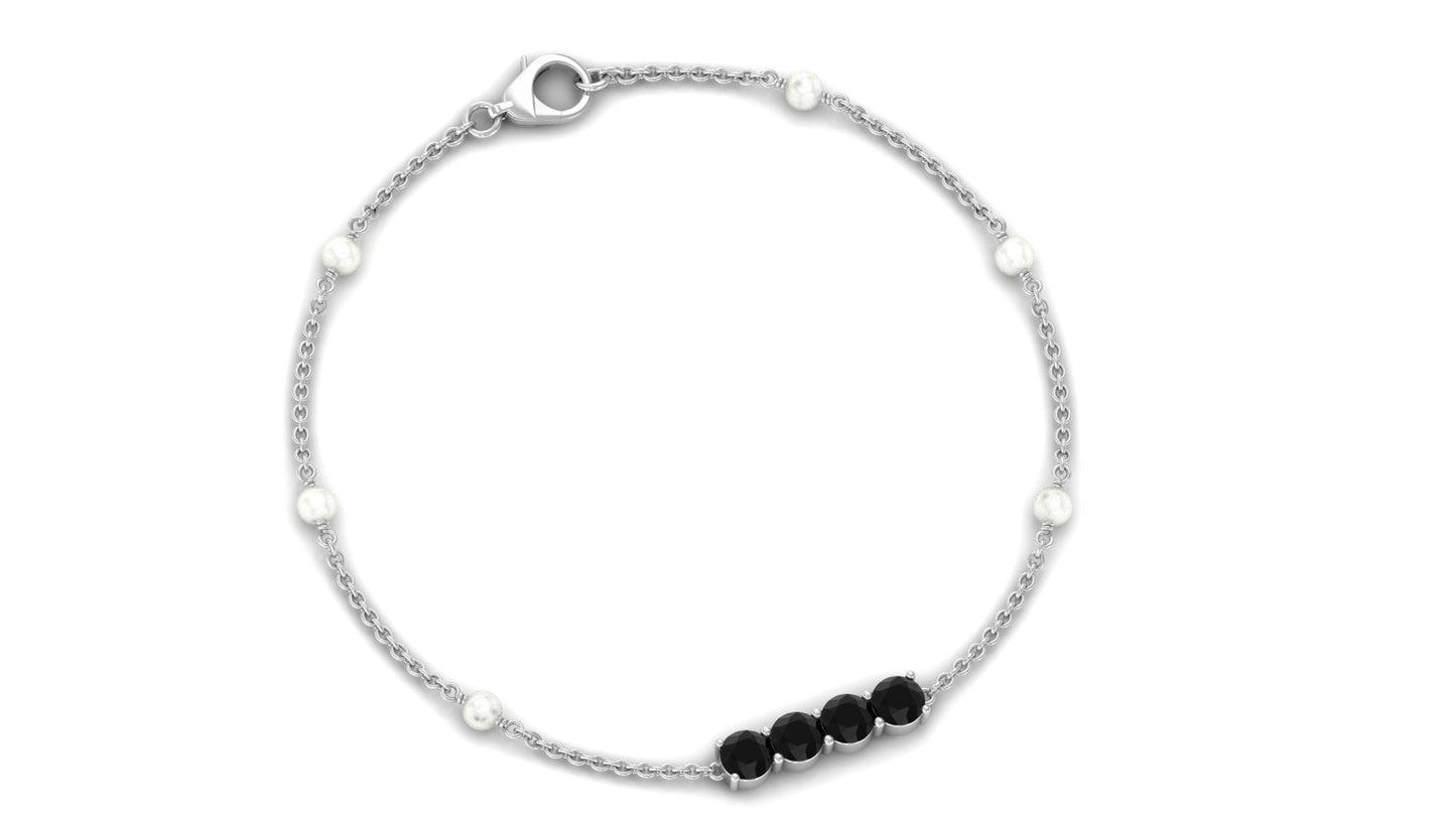 Black Onyx and Freshwater Pearl Station Bracelet