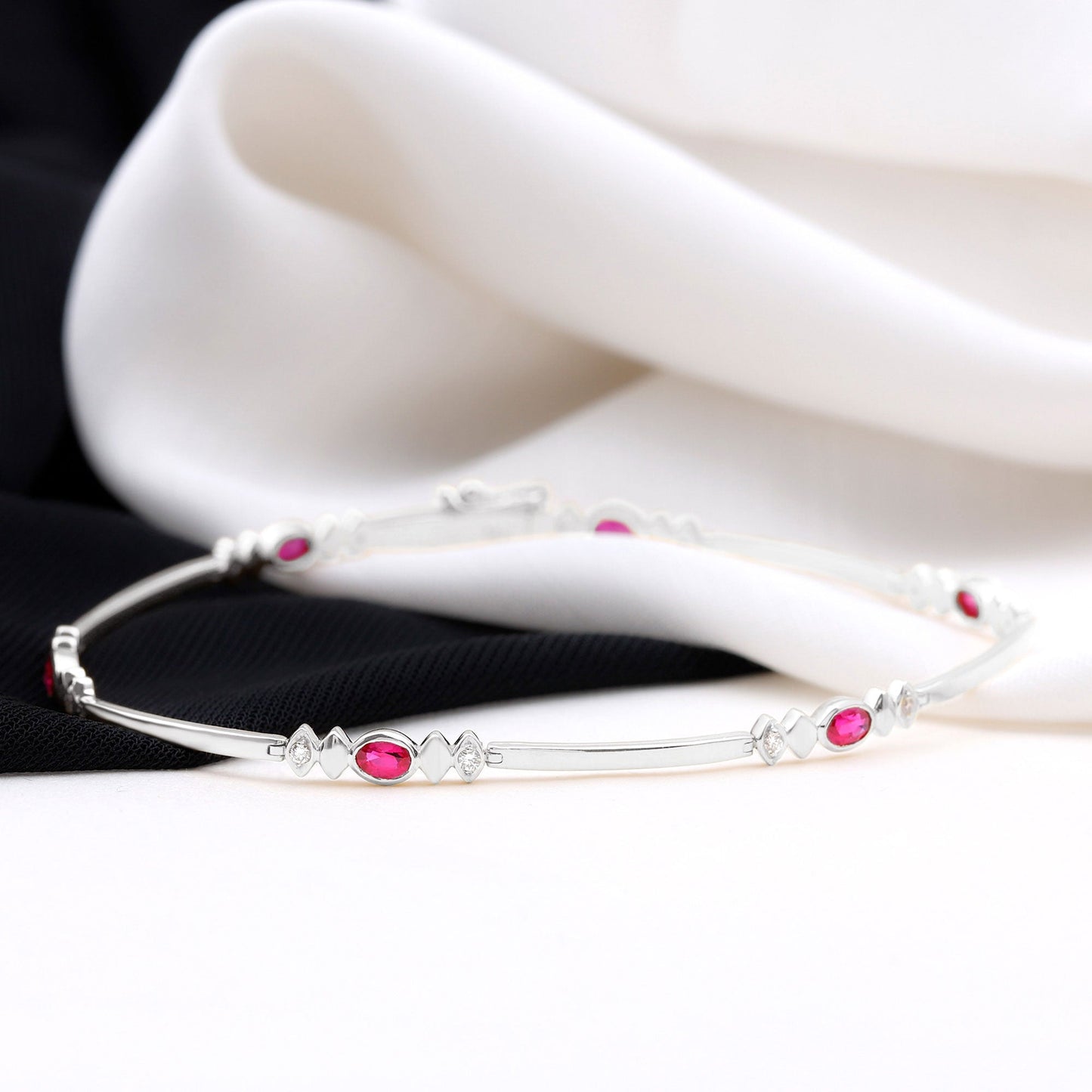 Oval Lab Grown Ruby Link Bracelet with Diamond