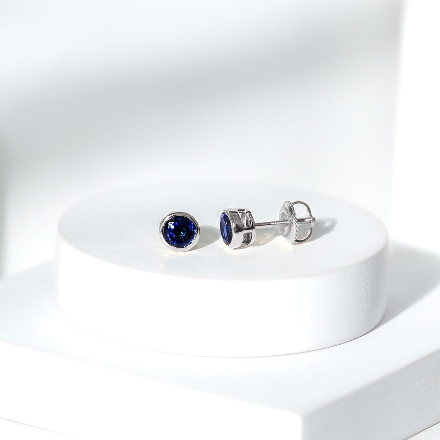 Solitaire 1.3 Carat Lab Created Blue Sapphire Stud Earrings in Bezel Setting