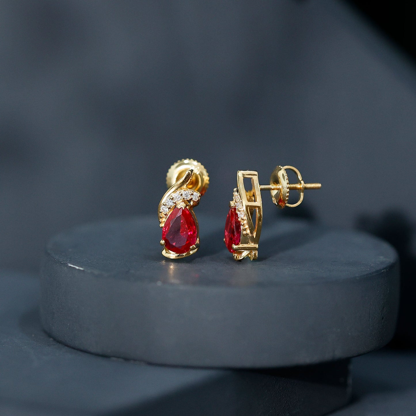 Lab Created Ruby Teardrop Stud Earrings with Diamond Accent