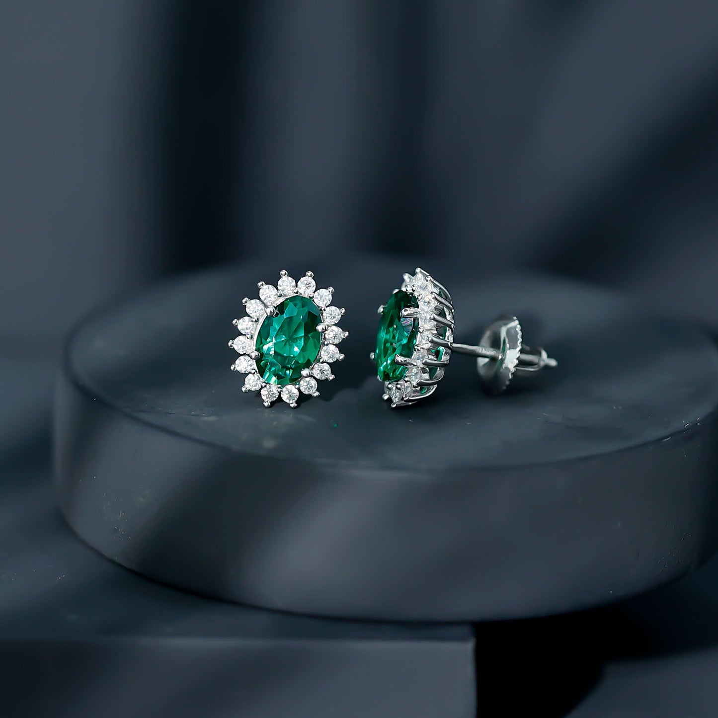 Lab Created Emerald Oval Stud Earrings with Moissanite Halo