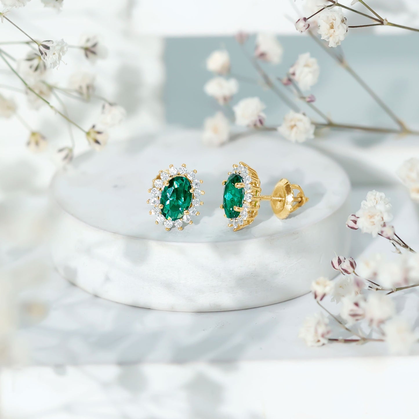 Lab Created Emerald Oval Stud Earrings with Moissanite Halo