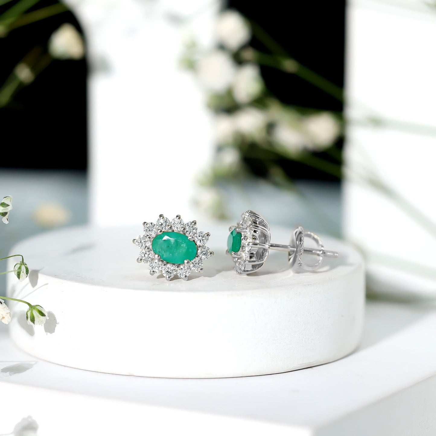 Natural 0.8 Carat Oval Cut Emerald and Diamond Earrings