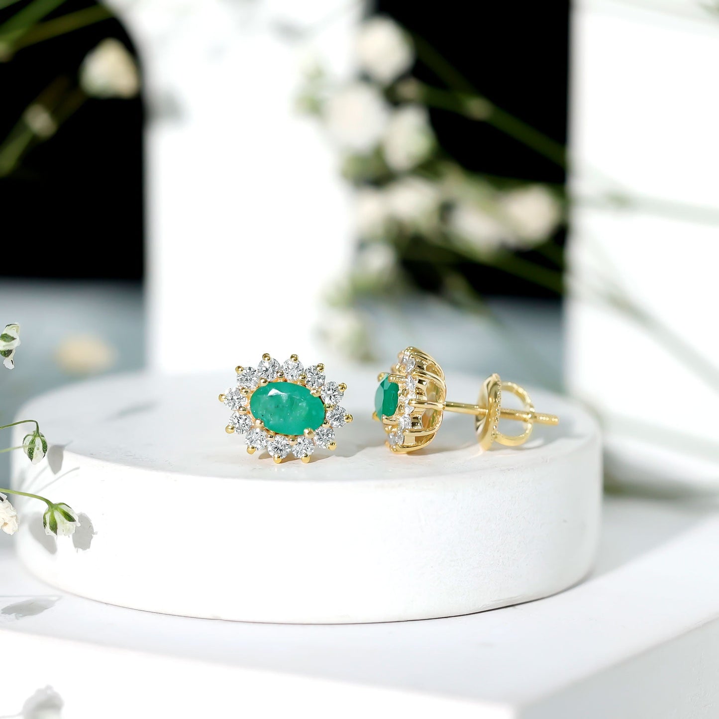 Natural 0.8 Carat Oval Cut Emerald and Diamond Earrings