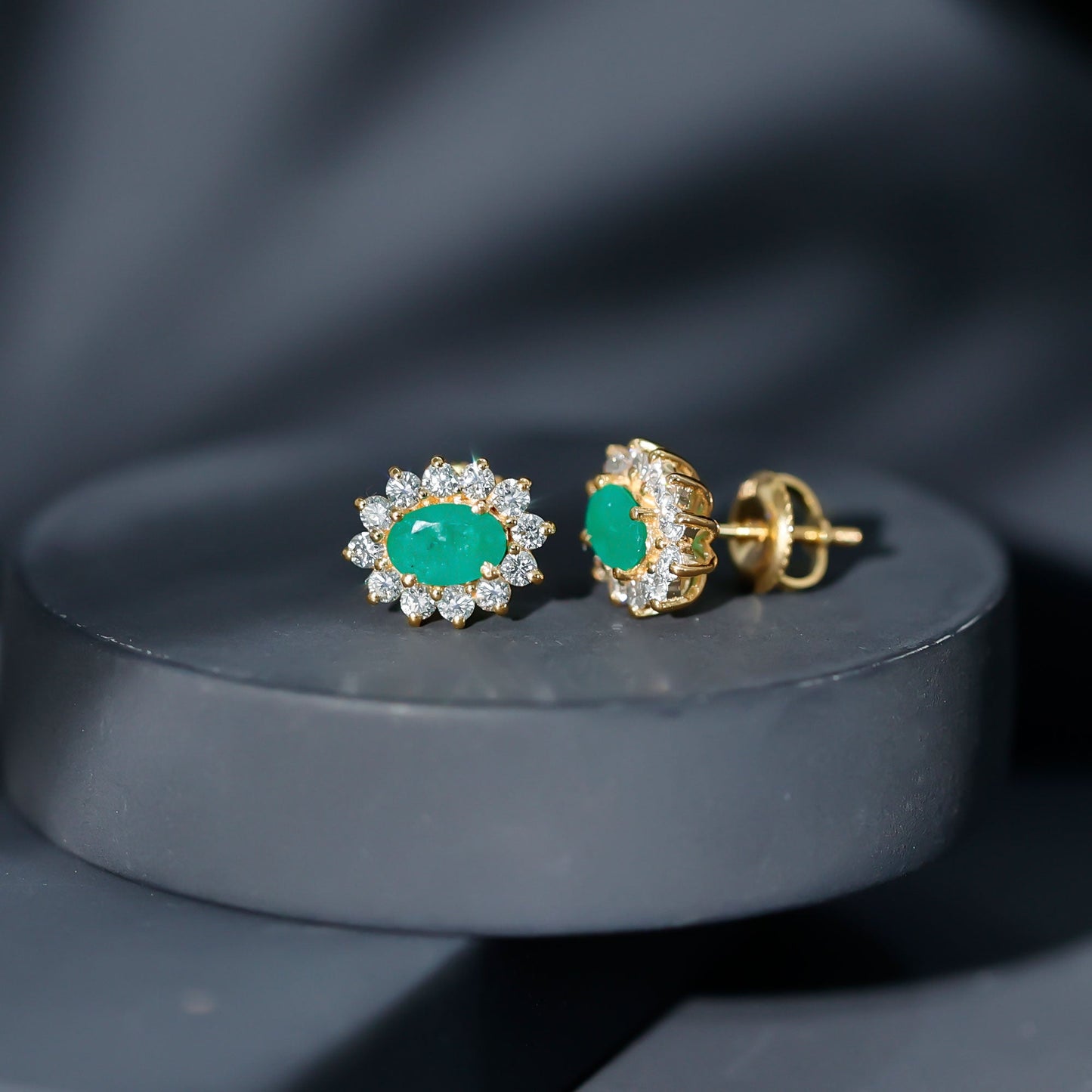 Natural 0.8 Carat Oval Cut Emerald and Diamond Earrings