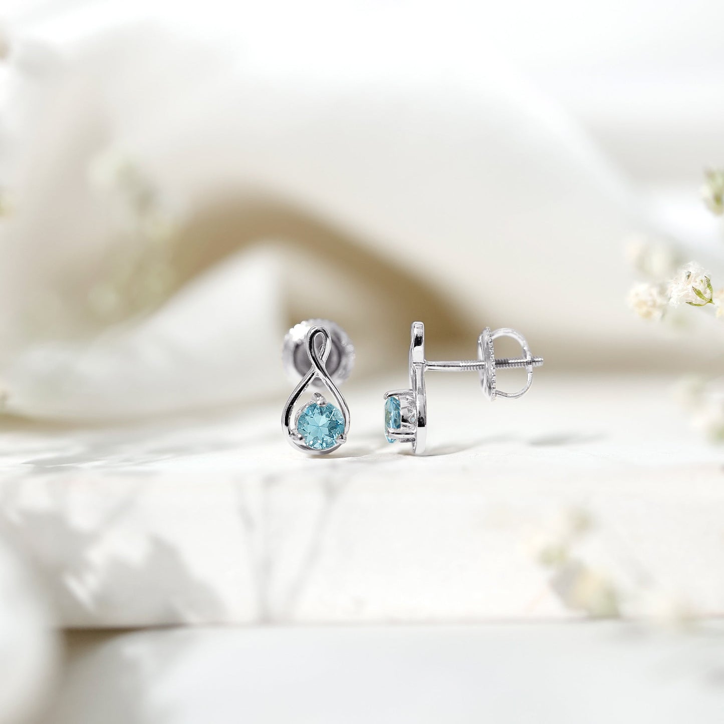 Genuine 0.5 Carat Aquamarine Infinity Stud Earrings