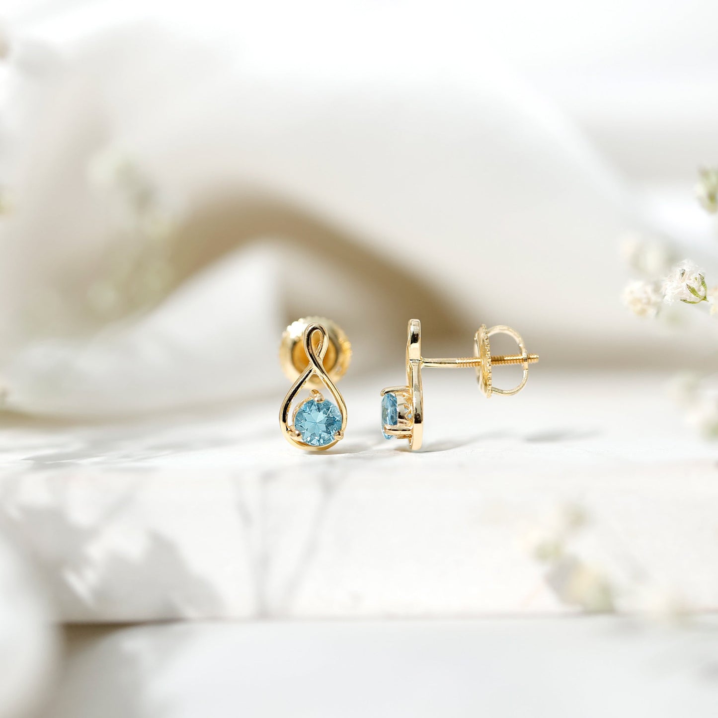 Genuine 0.5 Carat Aquamarine Infinity Stud Earrings