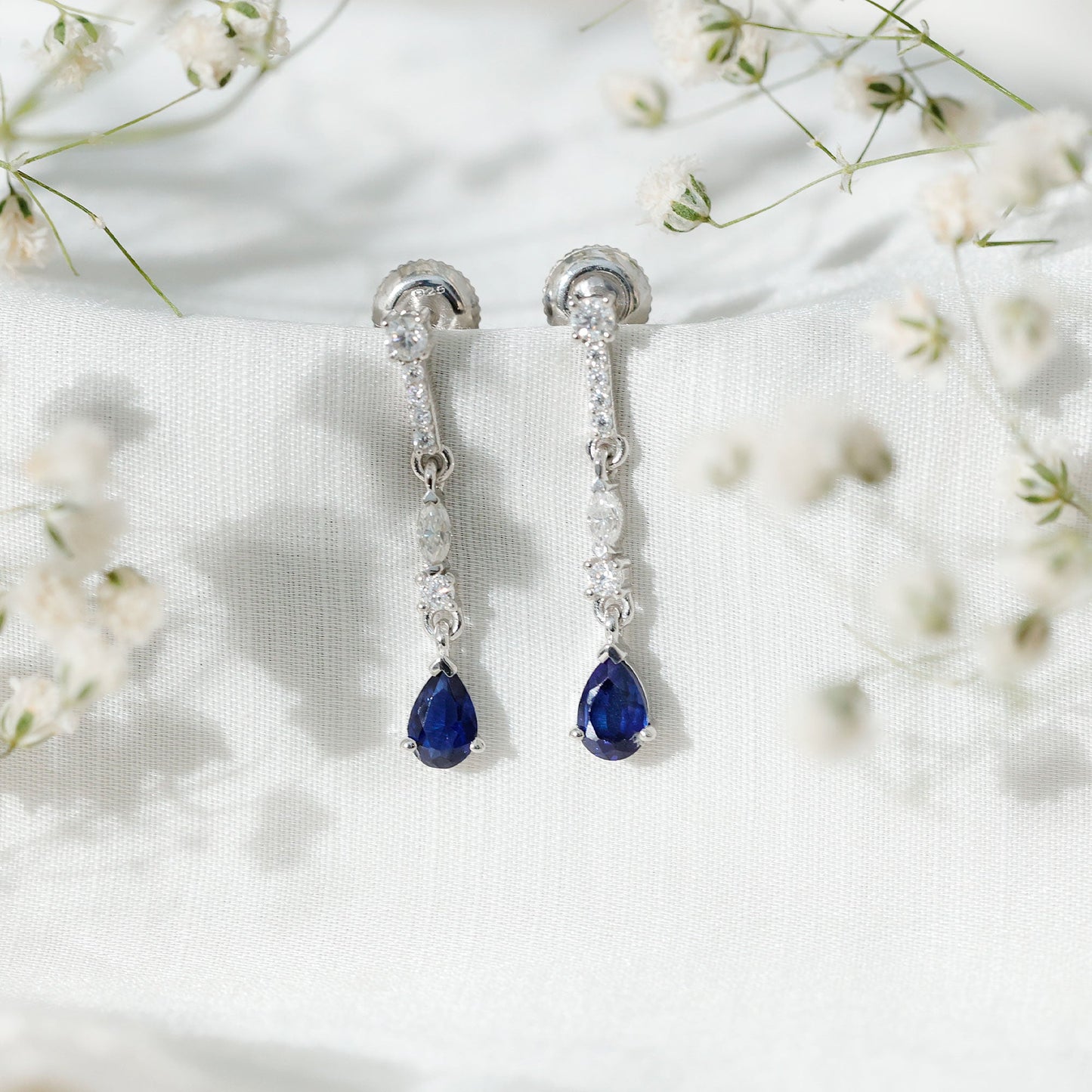 Pear Cut Created Blue Sapphire and Moissanite Long Dangle Earrings