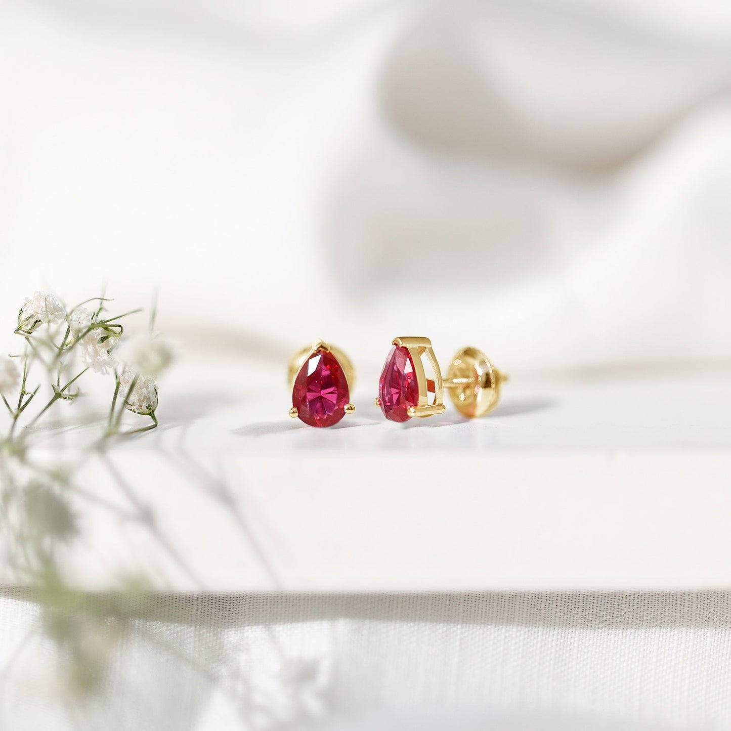 Solitaire 1.5 Carat Pear Shaped Lab Created Ruby Stud Earrings