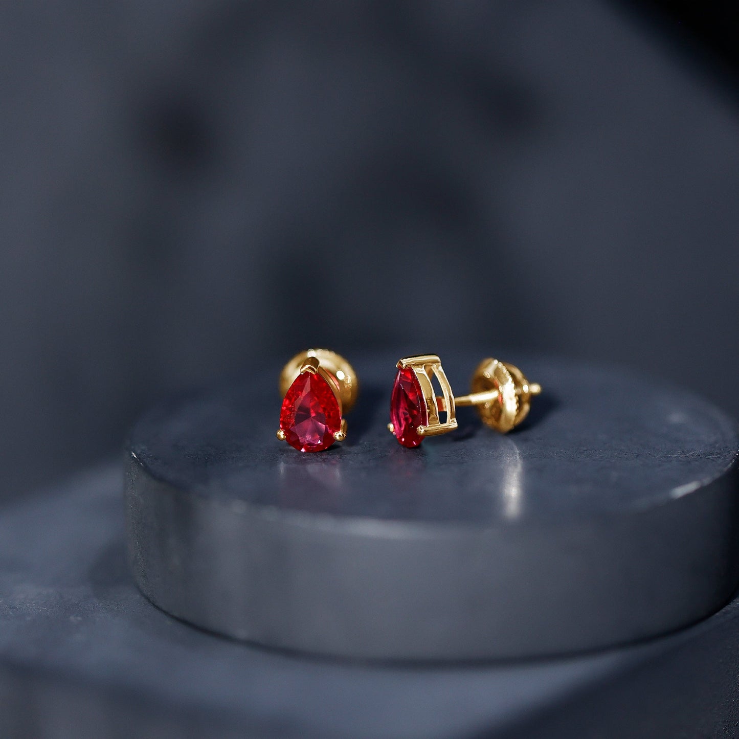 Solitaire 1.5 Carat Pear Shaped Lab Created Ruby Stud Earrings