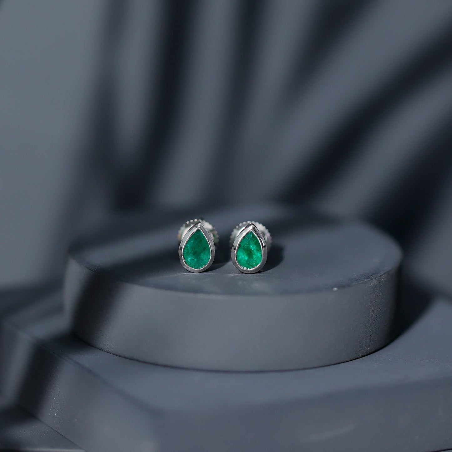 Genuine Emerald Teardrop Stud Earrings in Bezel Setting