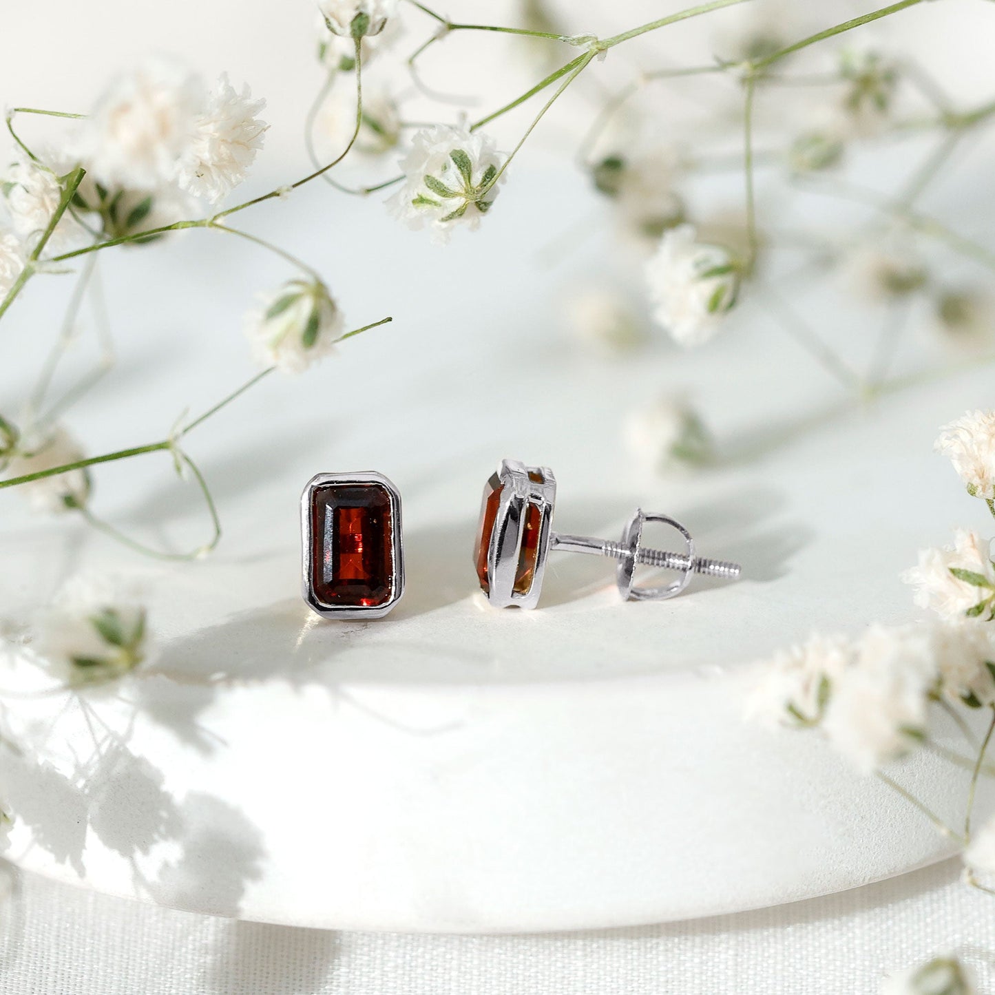 1.4 CT Emerald Cut Garnet Solitaire Stud Earrings in Bezel Setting