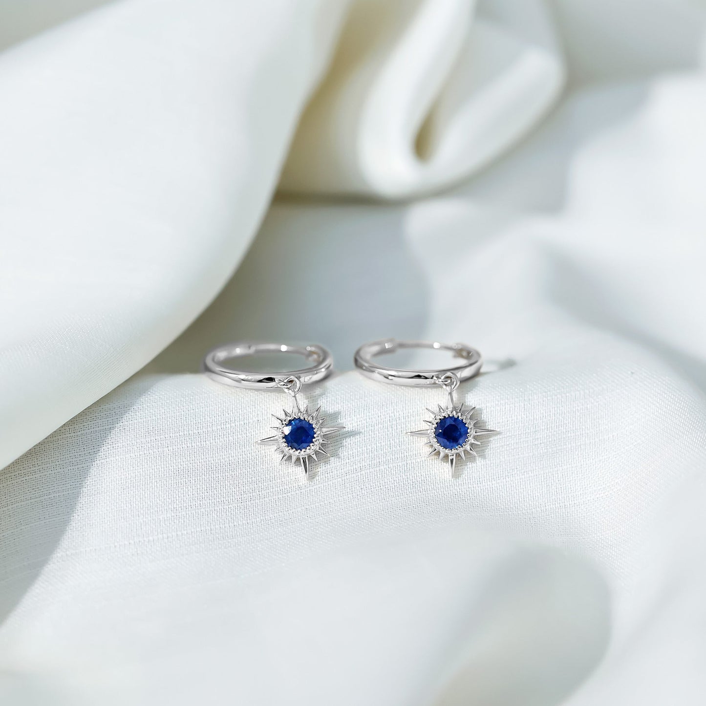 Bezel Set Blue Sapphire Sunburst Drop Hoop Earrings