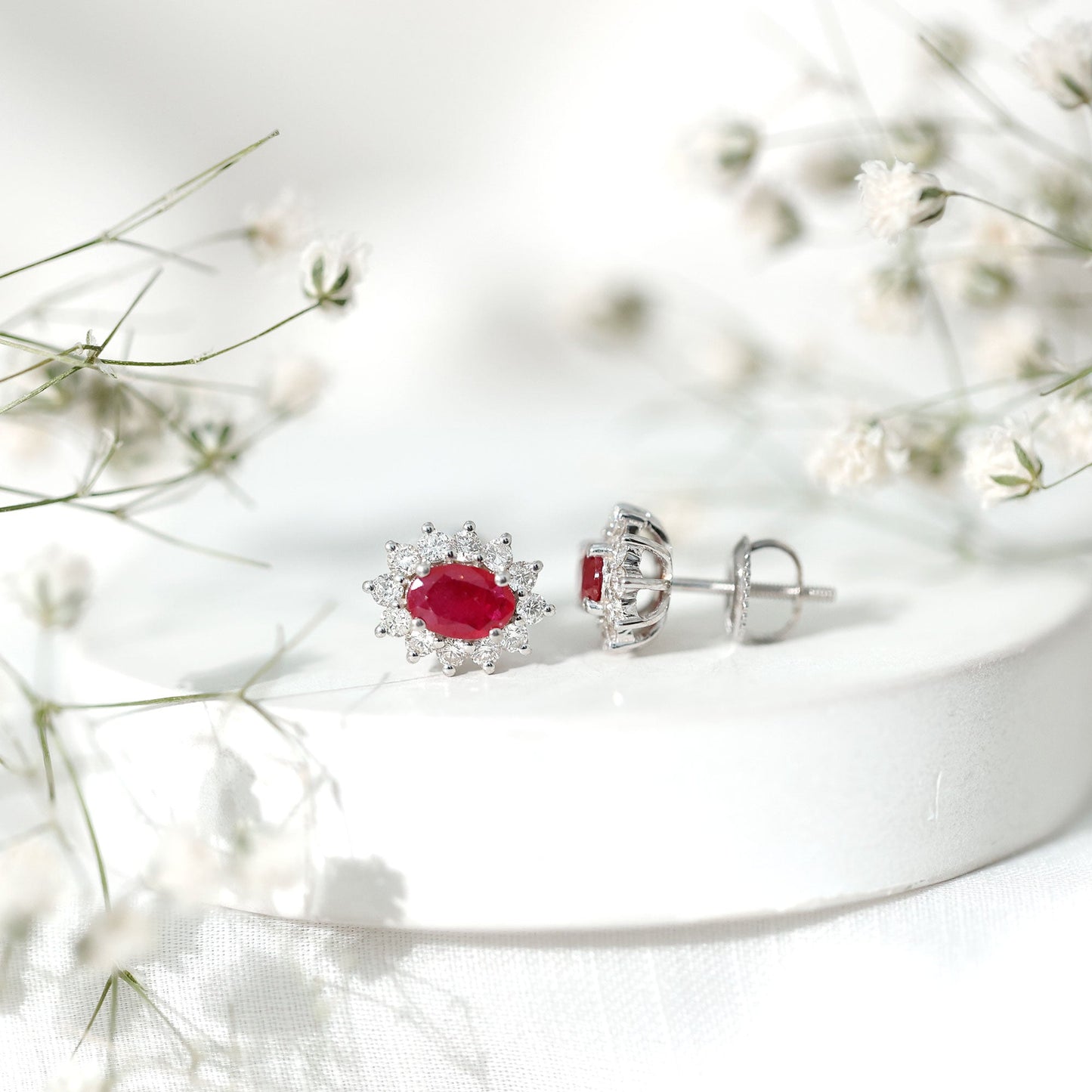 Genuine Oval Cut Ruby and Diamond Halo Stud Earrings