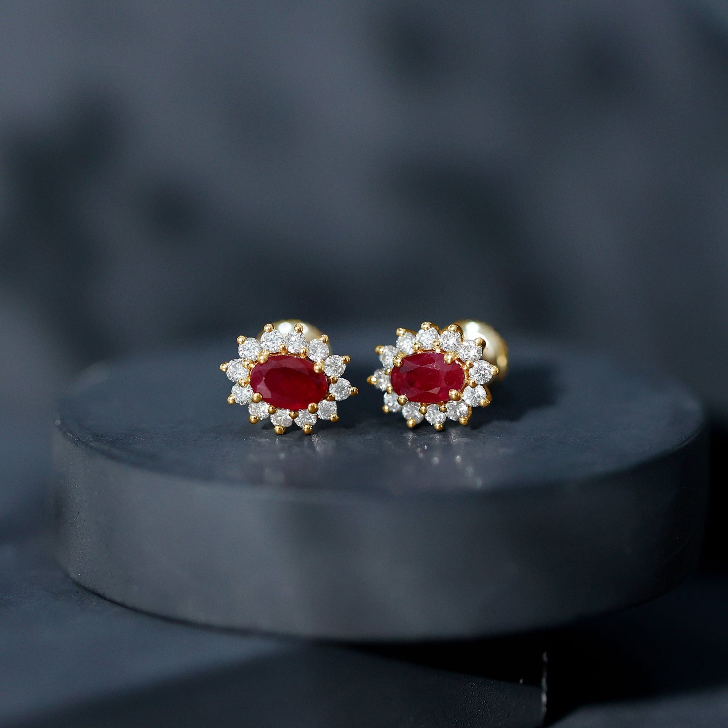 Genuine Oval Cut Ruby and Diamond Halo Stud Earrings