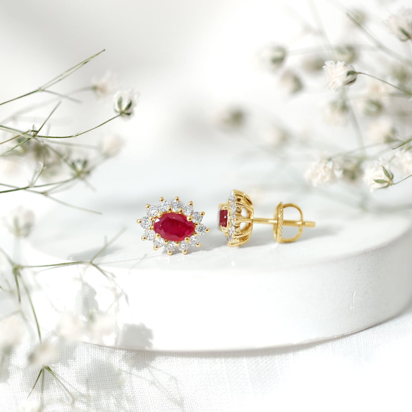 Genuine Oval Cut Ruby and Diamond Halo Stud Earrings