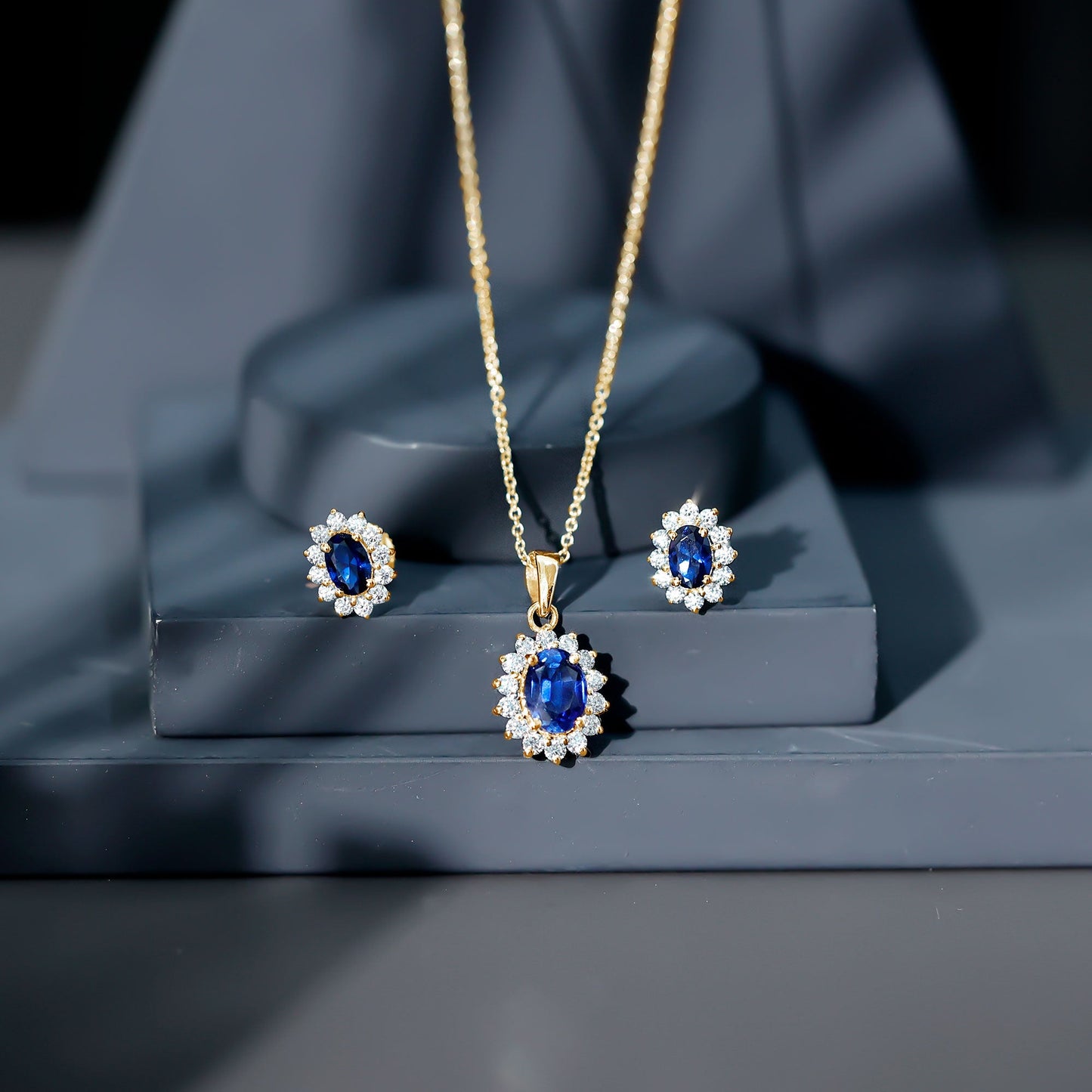 Oval Shaped Lab Created Blue Sapphire Necklace and Earrings Set with Moissanite Halo