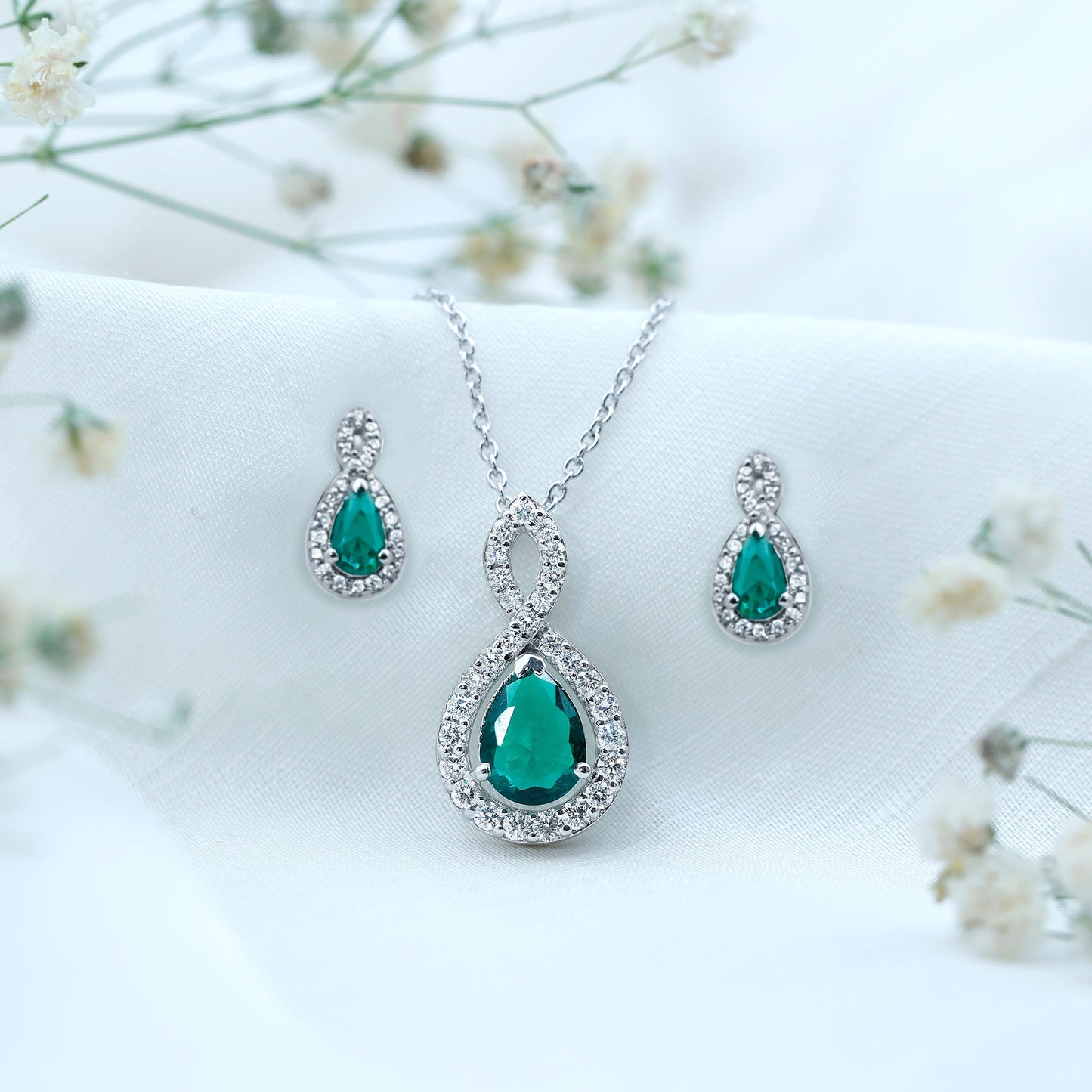 Pear Shaped Lab Created Emerald and Diamond Infinity Jewelry Set