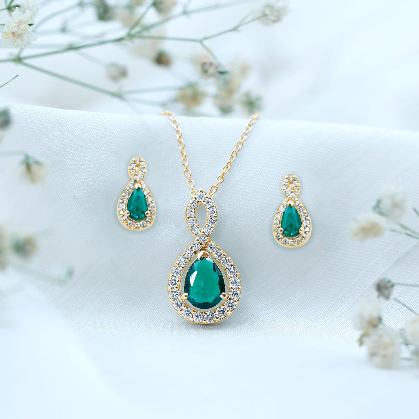Pear Shaped Lab Created Emerald and Diamond Infinity Jewelry Set