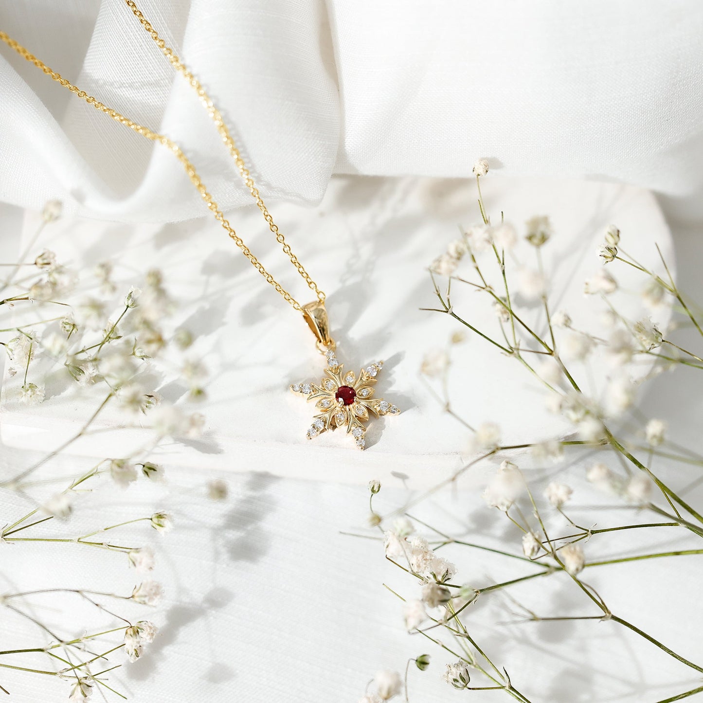 Lab Created Ruby Snowflake Pendant with Diamond Accent