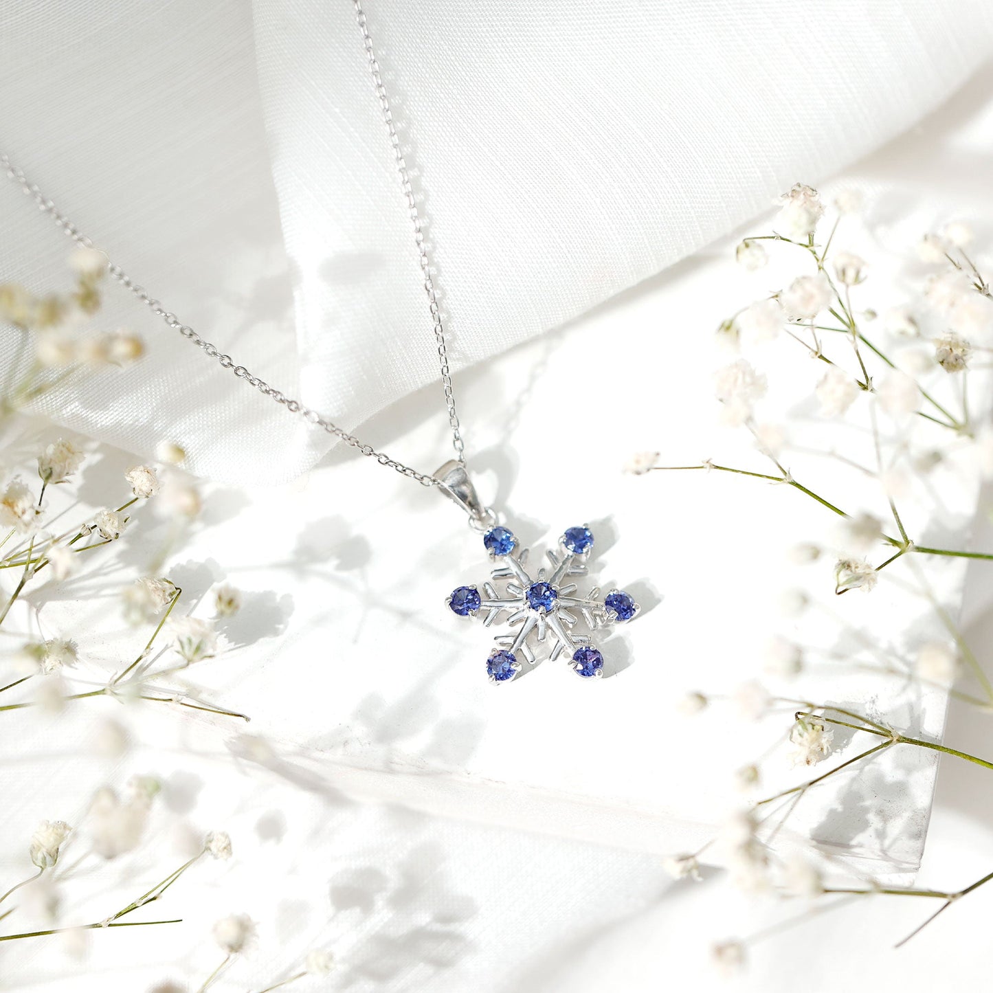 Lab Created Blue Sapphire Snowflake Pendant Necklace With Chain