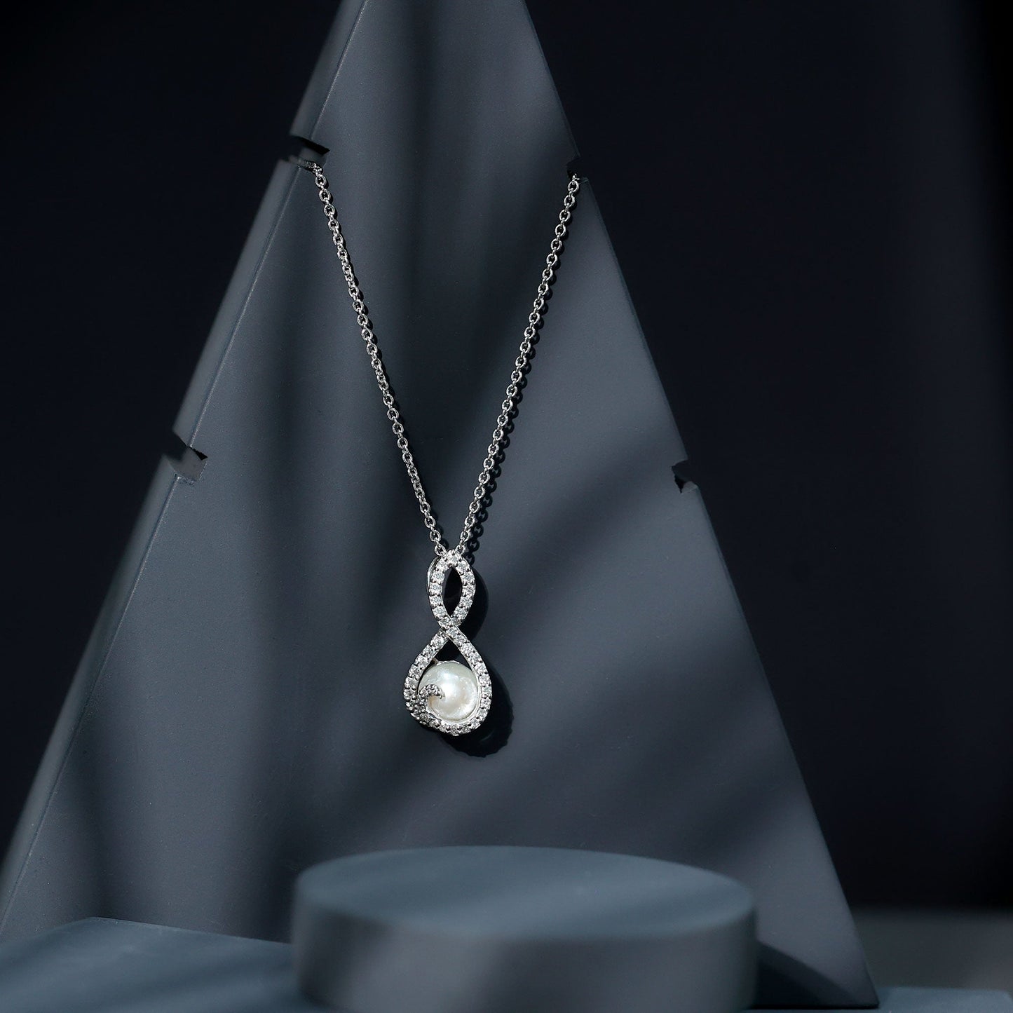 Freshwater White Pearl and Moissanite Infinity Pendant in Silver