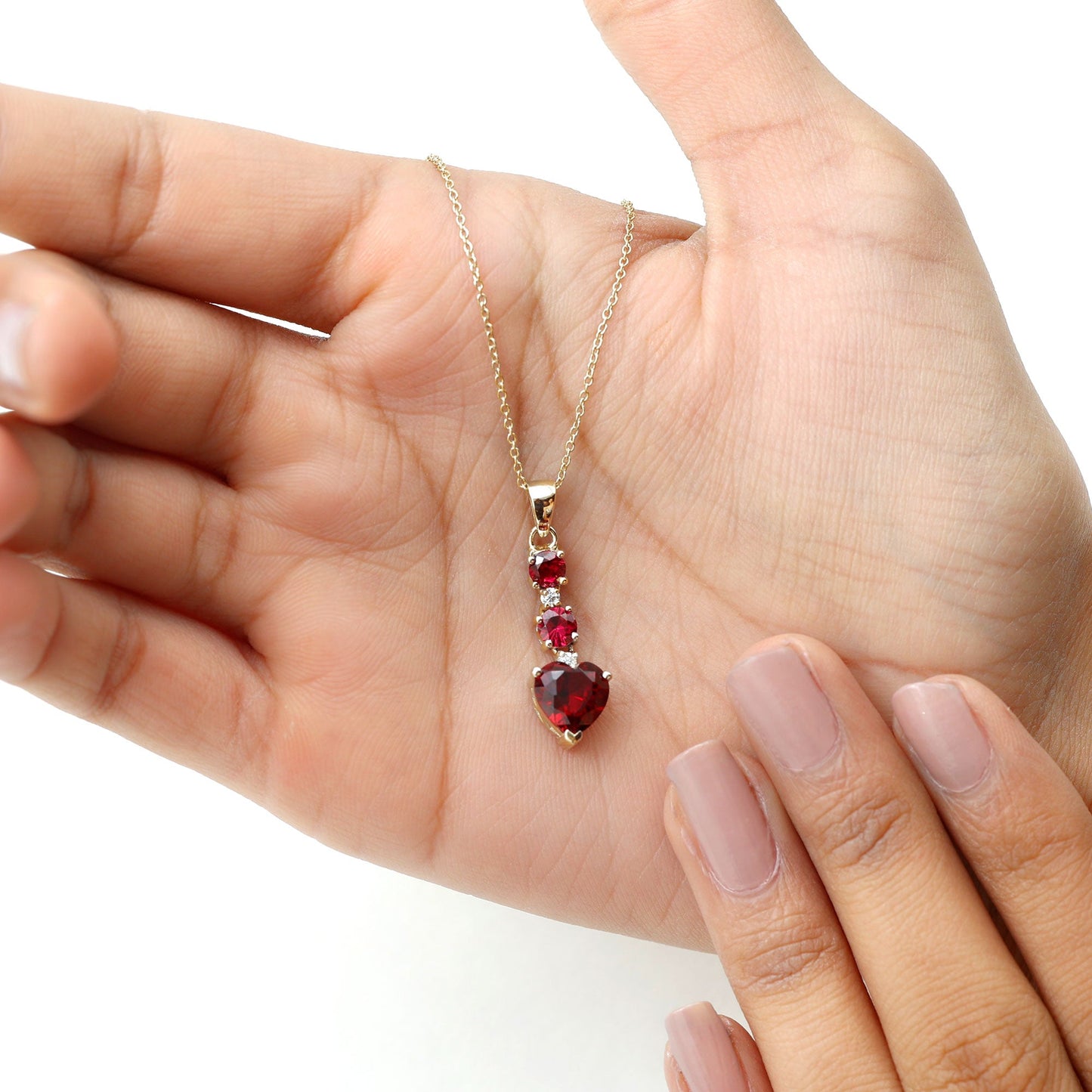 Created Ruby and Moissanite Heart Dangle Pendant Necklace