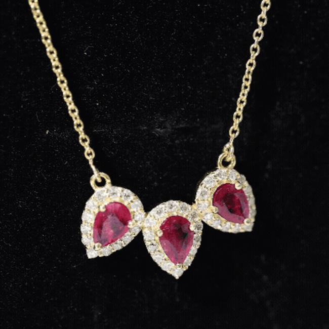 Pear Cut Lab Created Ruby Three Stone Necklace with Moissanite Halo