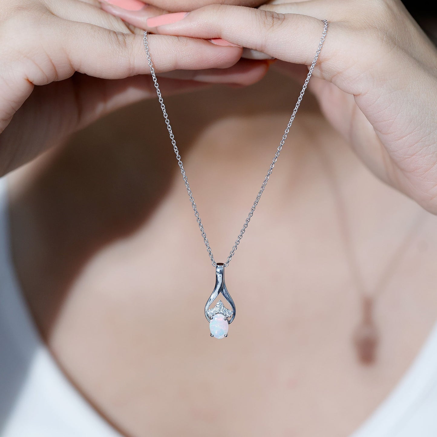 1.2 Carat Oval Ethiopian Opal Teardrop Pendant in Silver