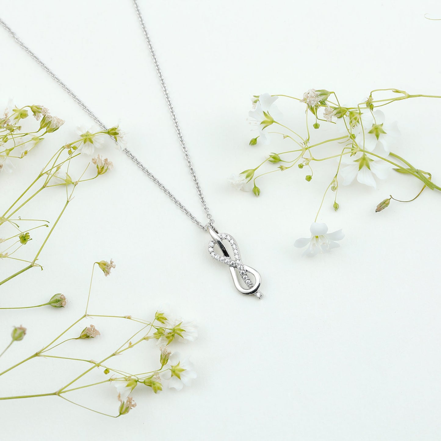 Minimal Moissanite Infinity Knot Pendant Necklace