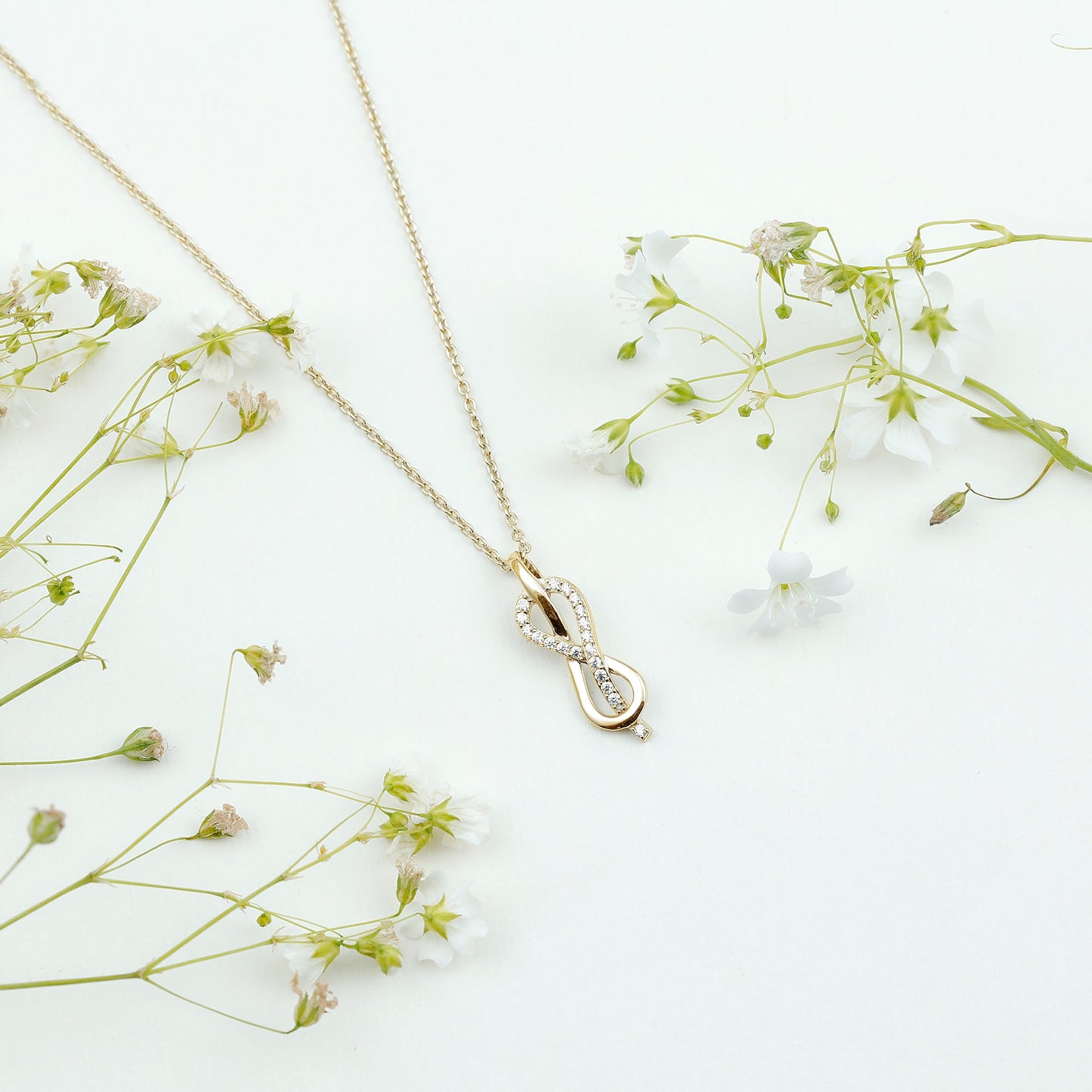 Minimal Moissanite Infinity Knot Pendant Necklace
