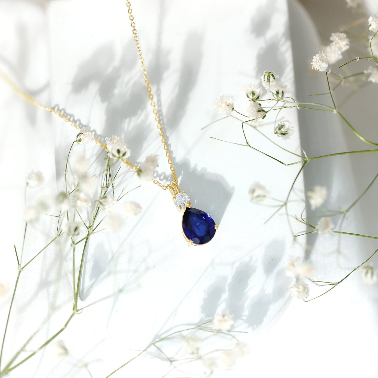 Lab Created Blue Sapphire Teardrop Pendant Necklace with Diamond