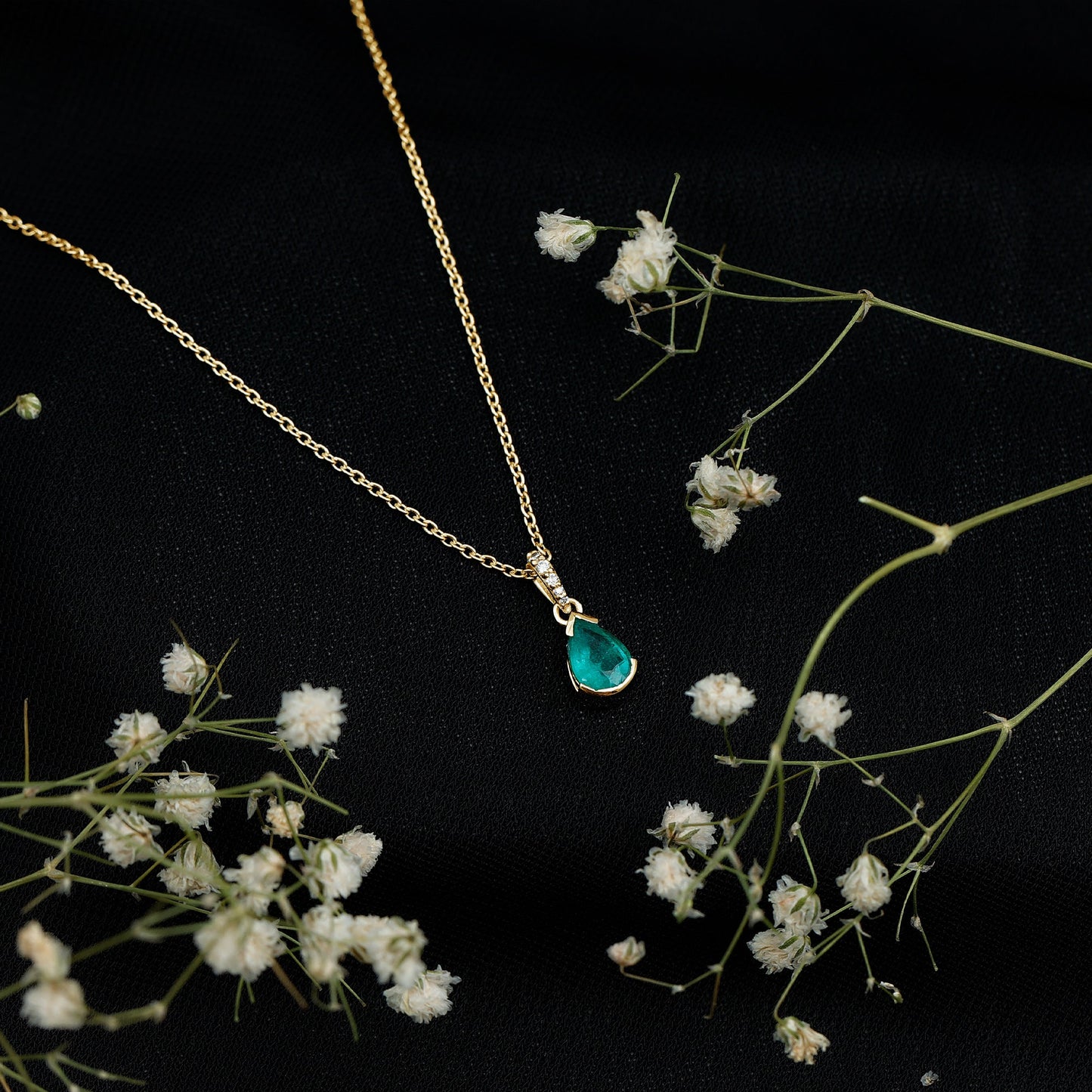 Pear Cut Emerald Solitaire Pendant with Diamond Accent Bail