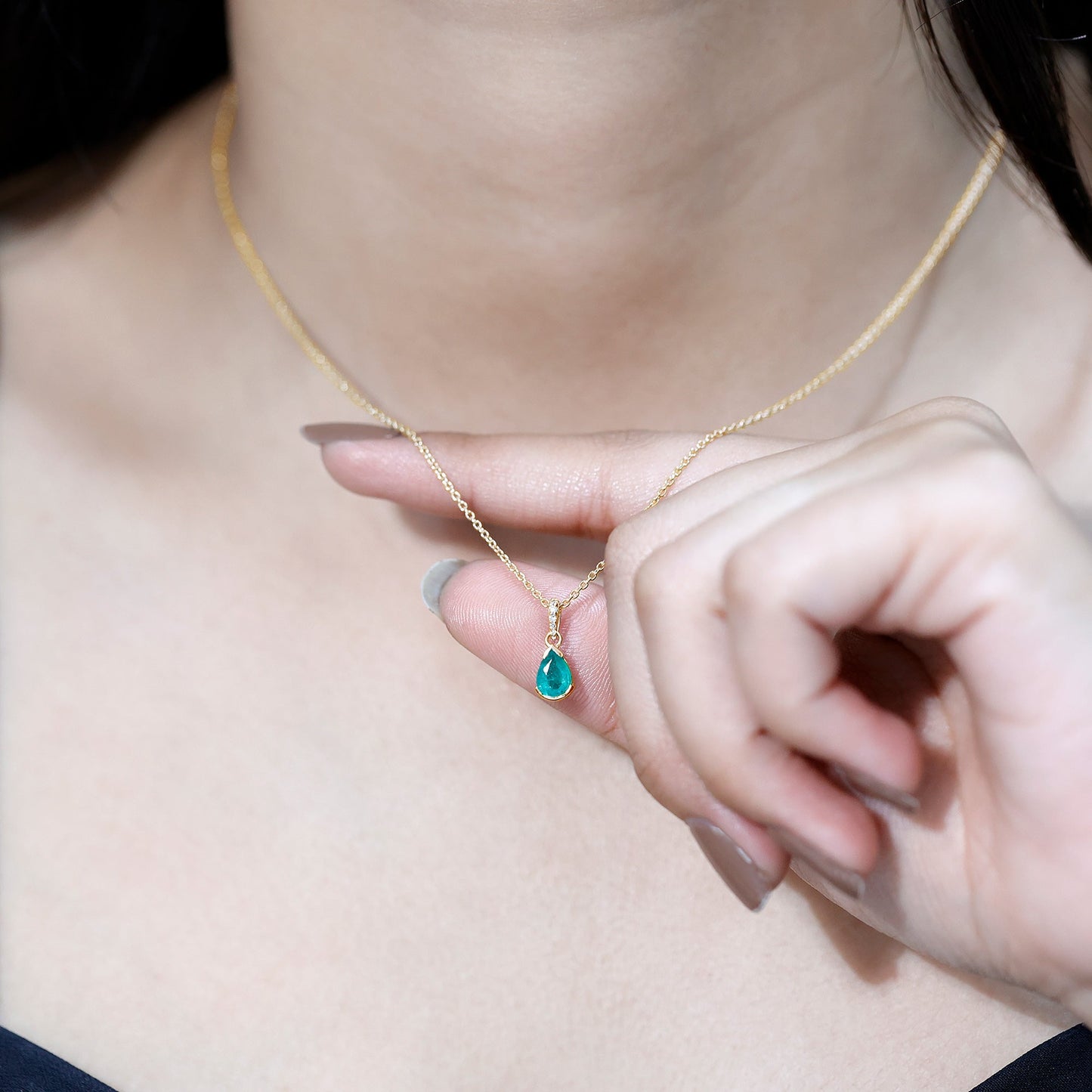 Pear Cut Emerald Solitaire Pendant with Diamond Accent Bail