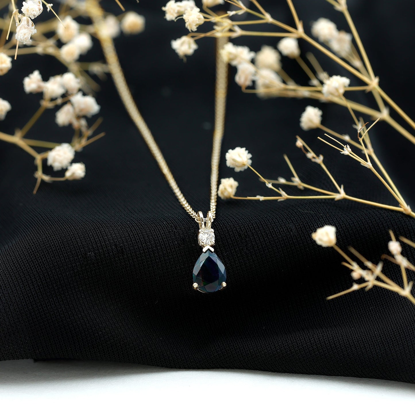 Pear Shaped Black Opal Drop Pendant with Diamond