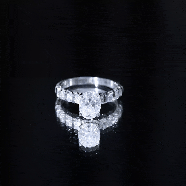 Oval Moissanite Solitaire Engagement Ring with Side Stones