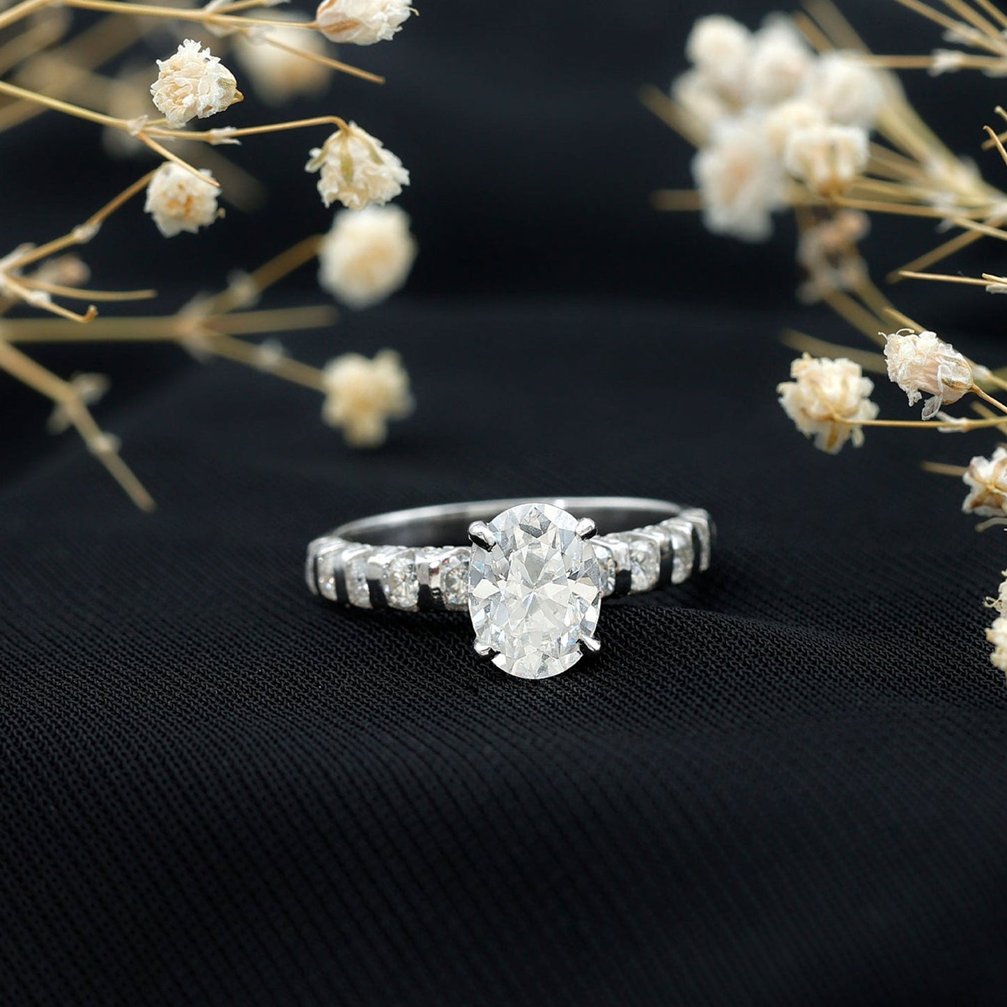 Oval Moissanite Solitaire Engagement Ring with Side Stones