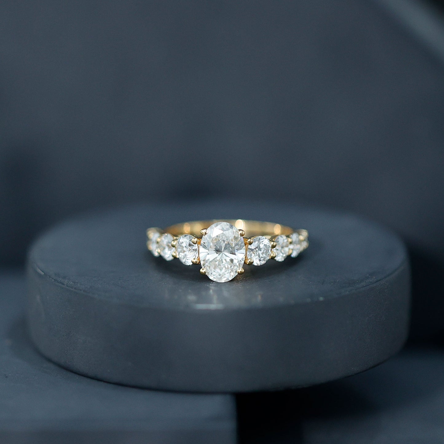 1.2 Carat Oval Cut Moissanite Side Stone Engagement Ring