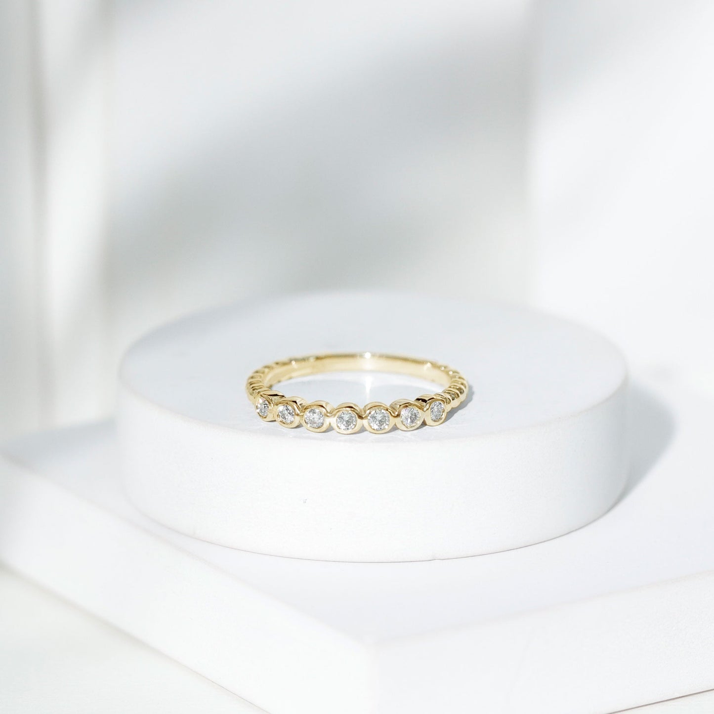 Bezel Set Round Diamond Half Eternity Ring