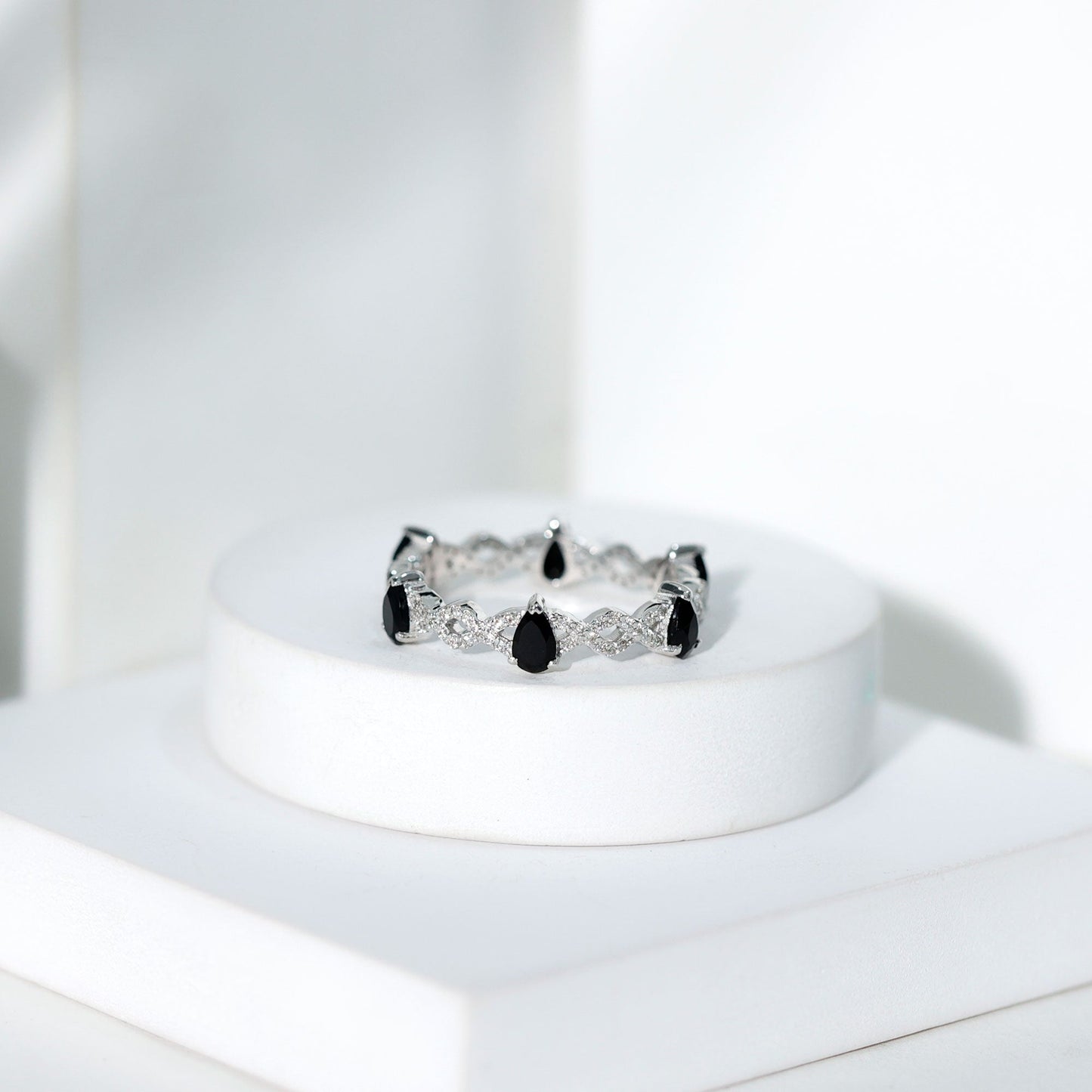 Pear Shaped Black Onyx and Diamond Crossover Wedding Band