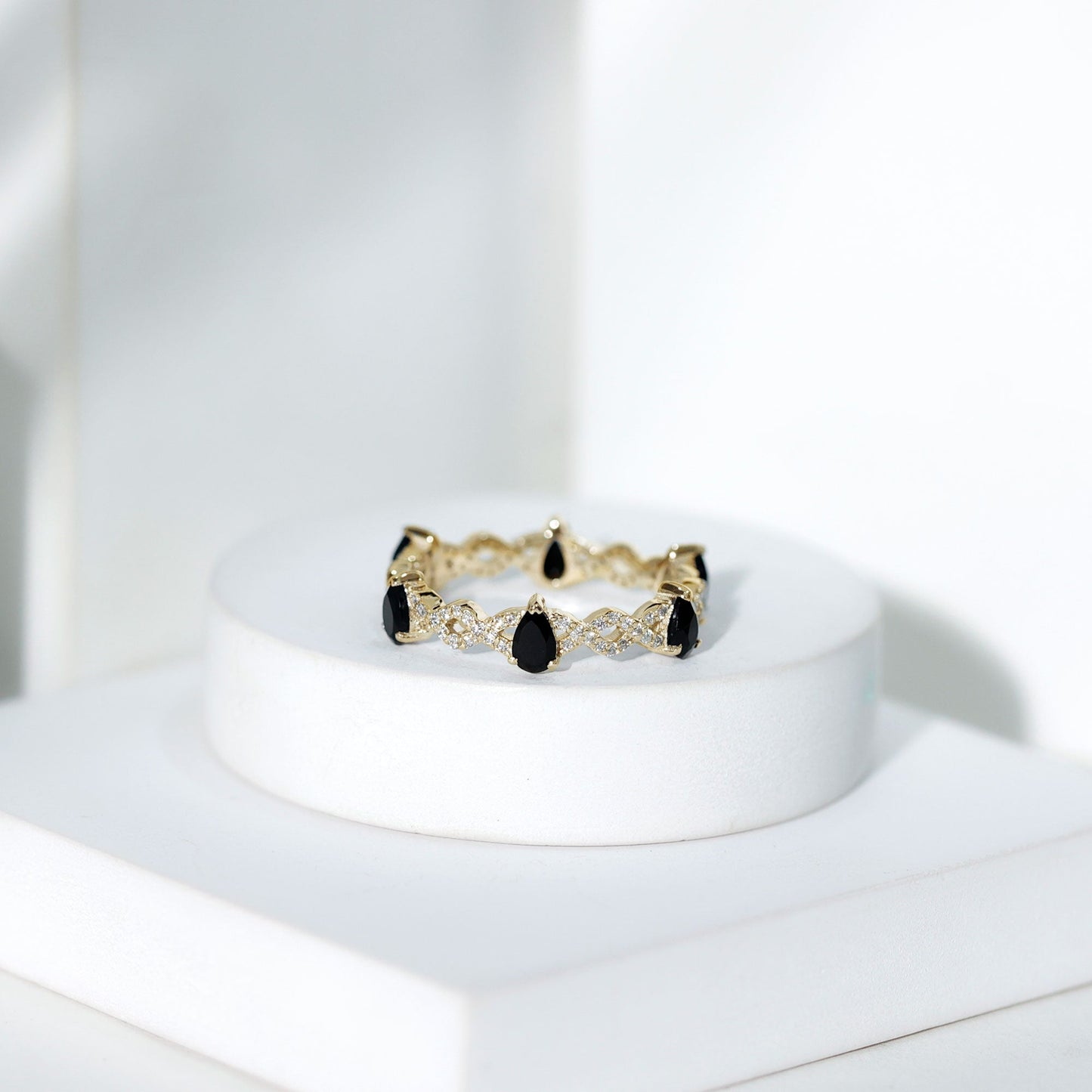 Pear Shaped Black Onyx and Diamond Crossover Wedding Band