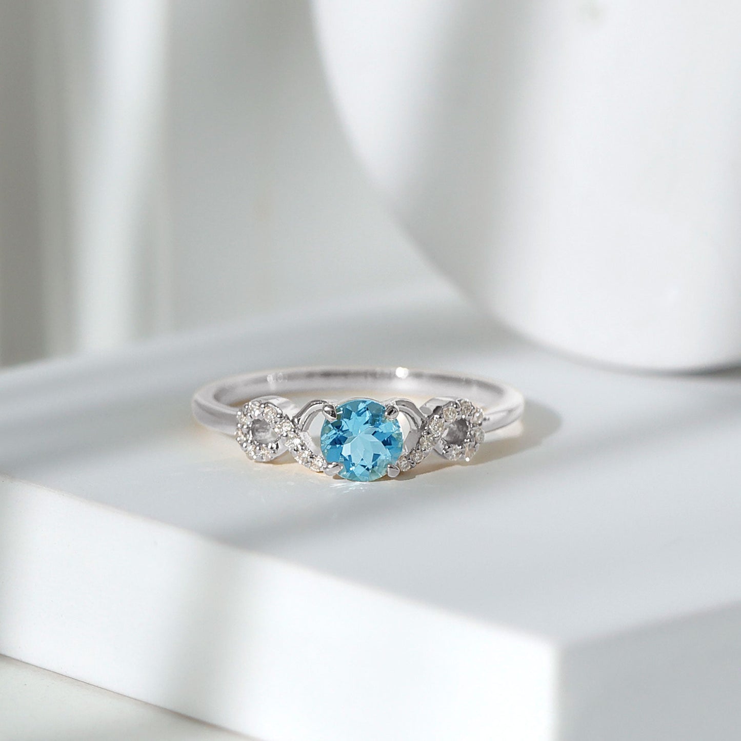 Round Shape Aquamarine and Diamond Infinity Engagement Ring