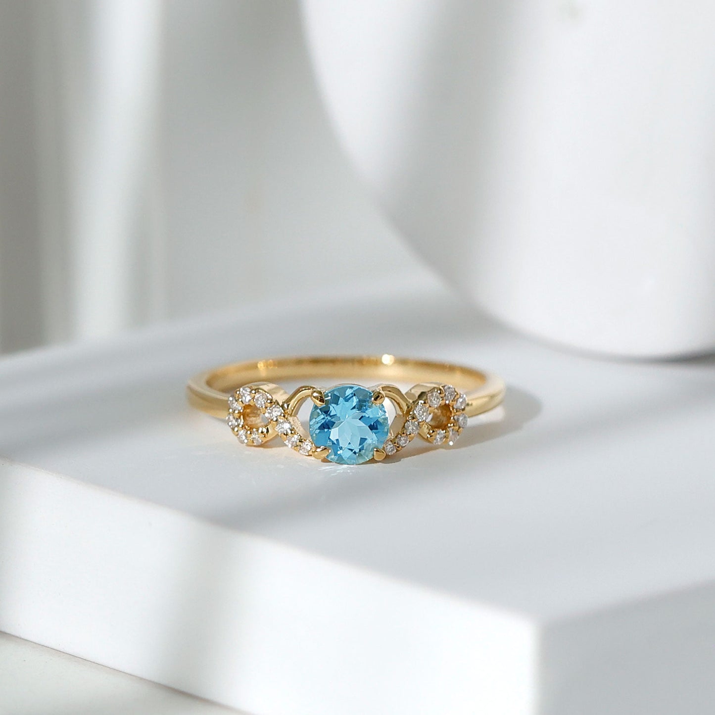 Round Shape Aquamarine and Diamond Infinity Engagement Ring