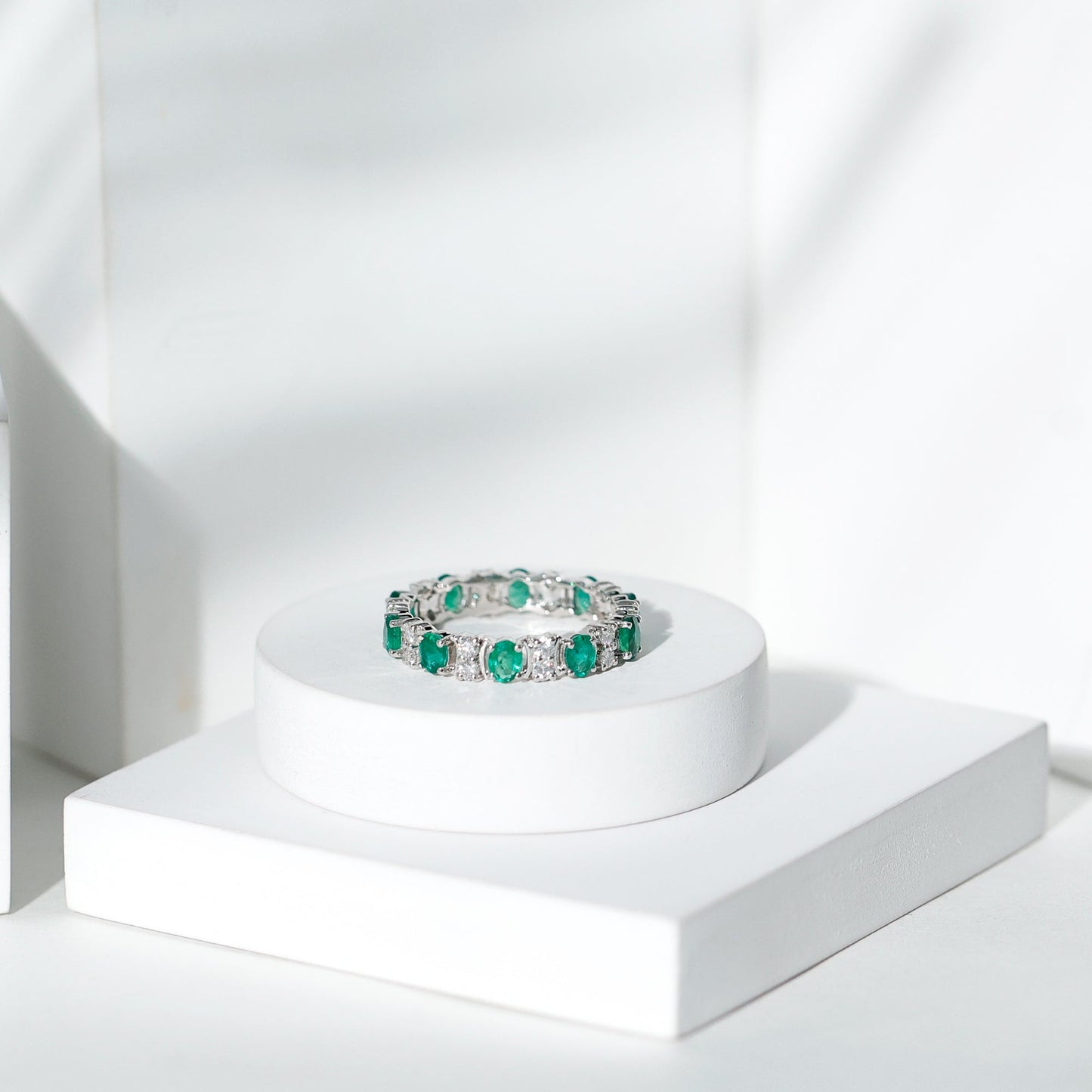 Oval Emerald and Moissanite Eternity Wedding Band