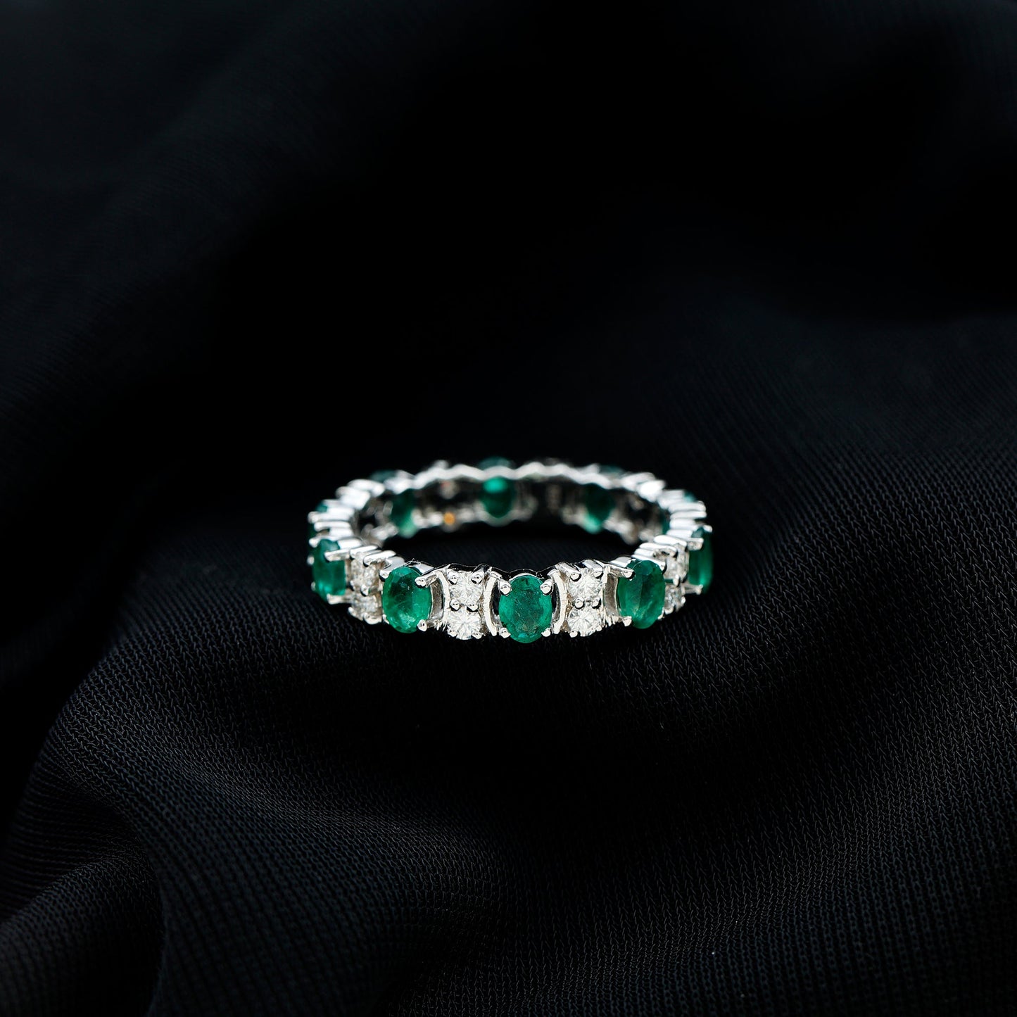 Oval Emerald and Moissanite Eternity Wedding Band