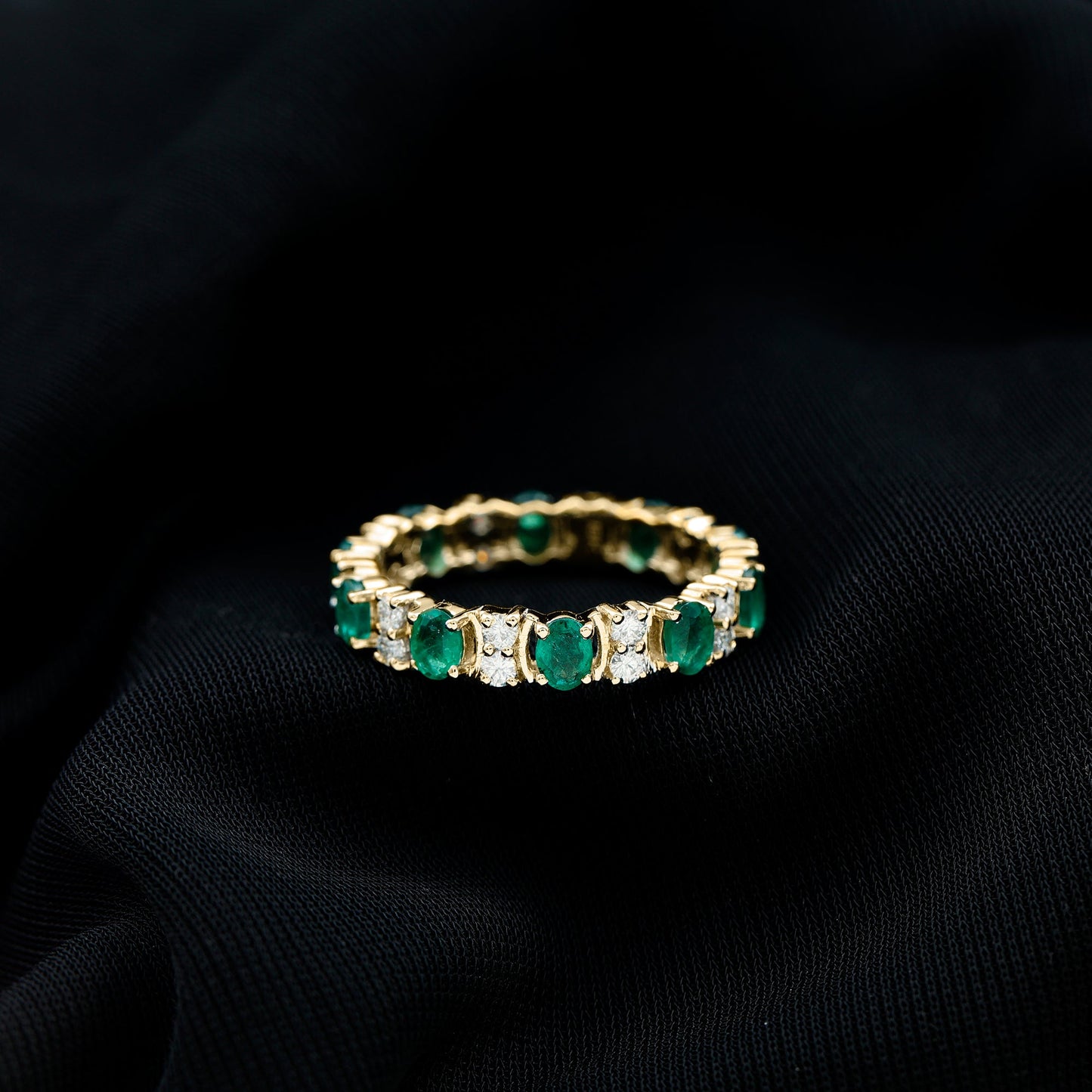 Oval Emerald and Moissanite Eternity Wedding Band